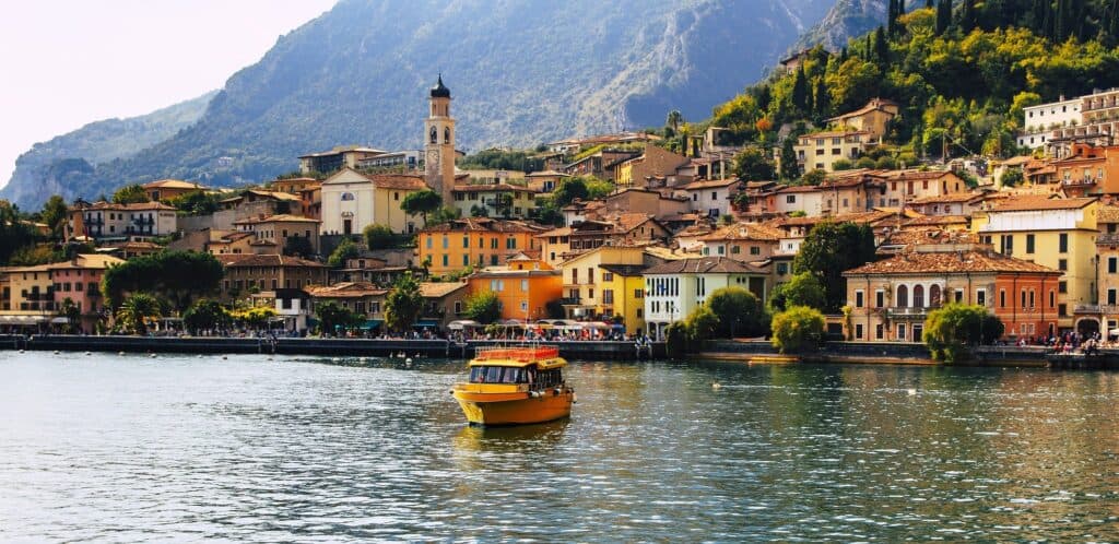 Colorful town of Lake Garda Italy with boat