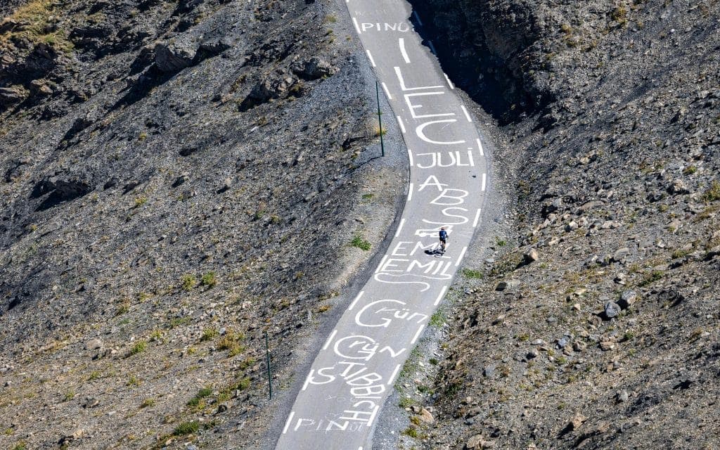 Tour de France Cyclists Names on Mountain Road
